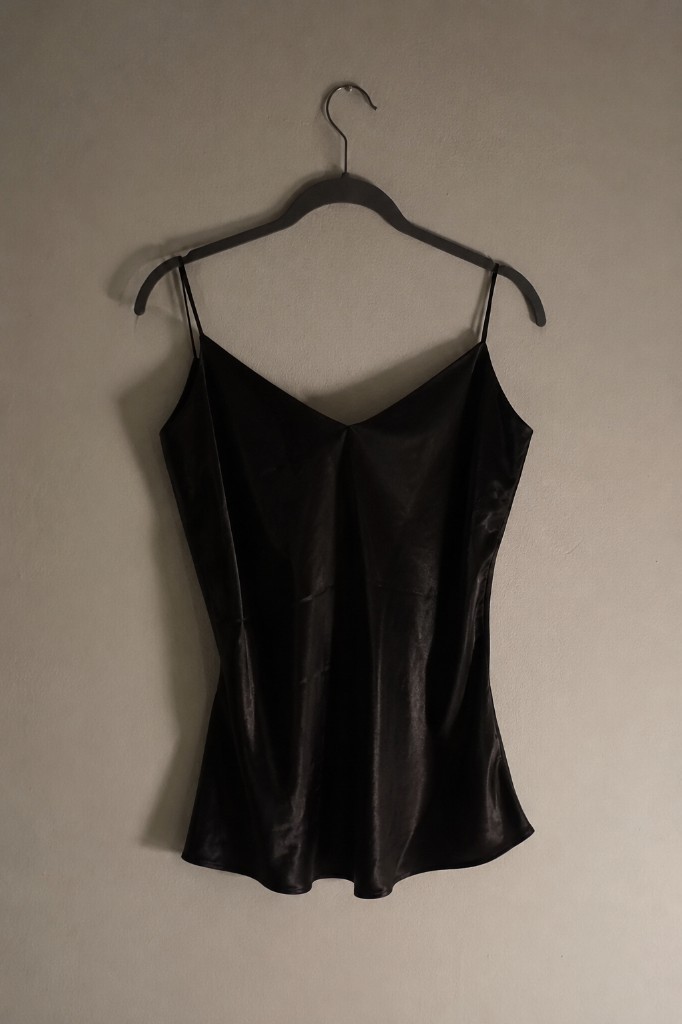 Original phone photo of the garment on a hanger